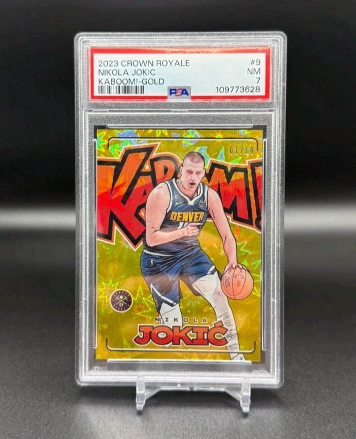 2023-24 Panini Crown Royale KABOOM! Gold #9 Nikola Jokic SSP 1/10 PSA 7 NM