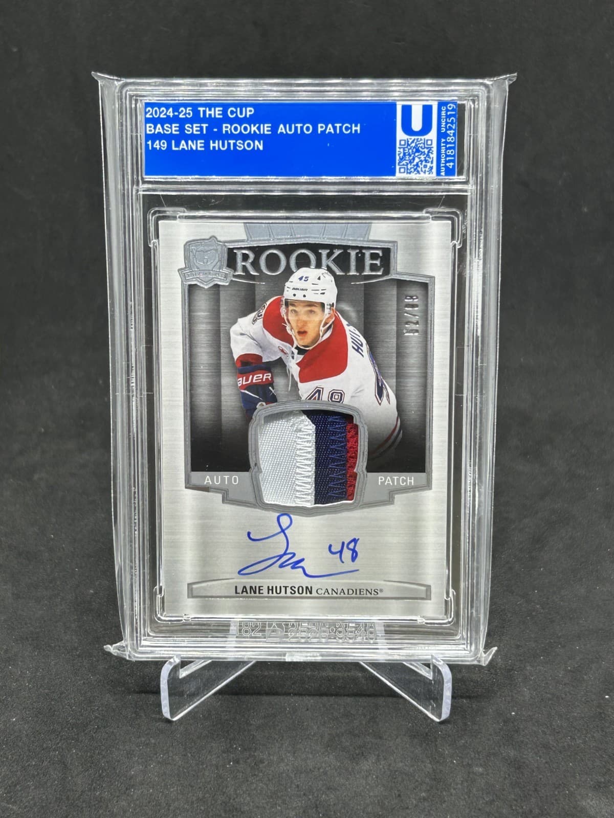 2024-25 Upper Deck The Cup Lane Hutson Rookie Patch Auto /99 3 Color Patch