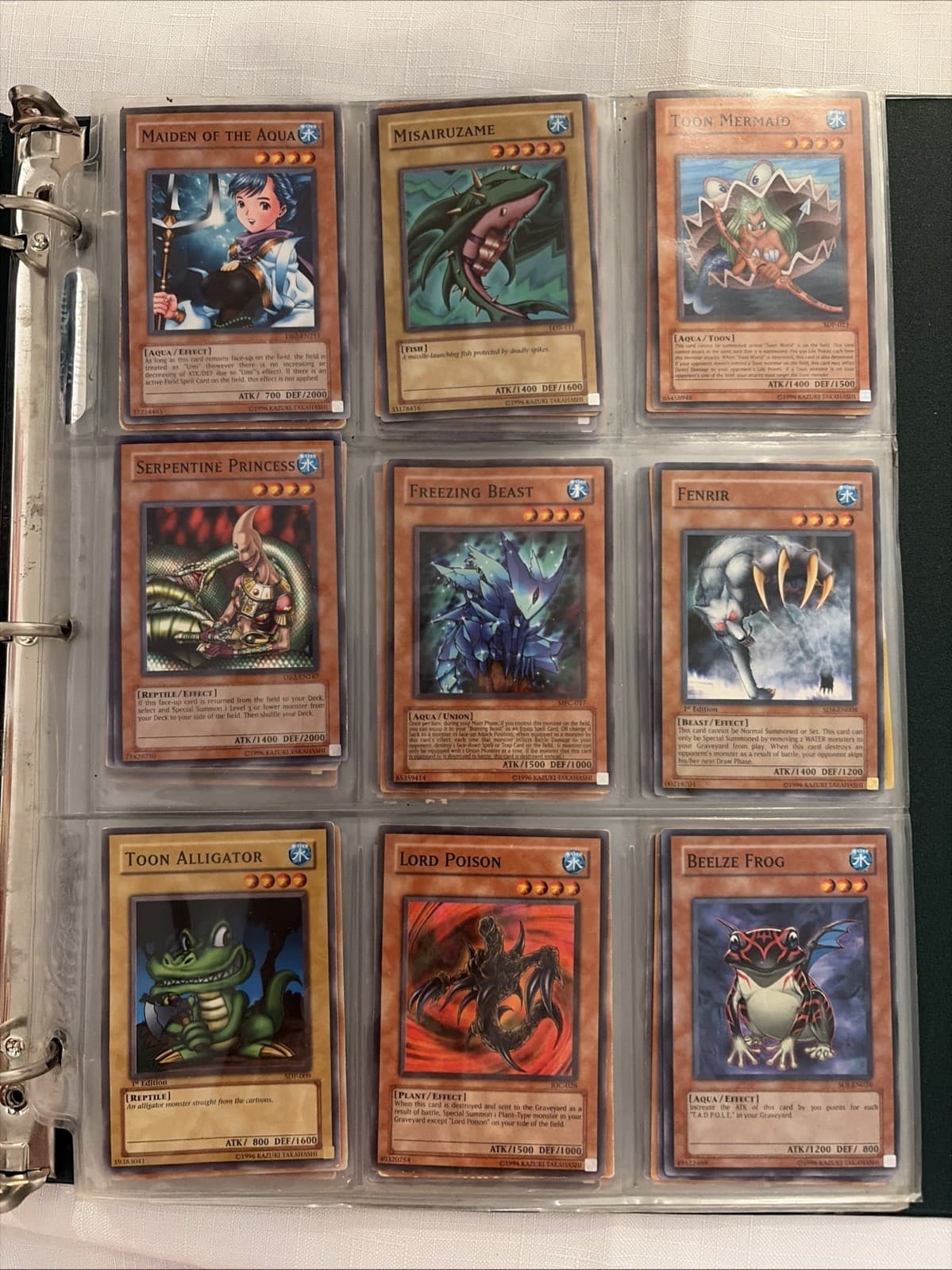 Vintage album with classic cards Yu-Gi-Oh! From Konami, water