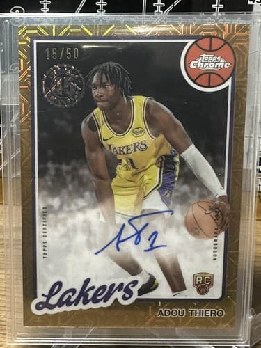 2025-26 Topps Basketball Adou Thiero Gold Mojo #/50 Lakers