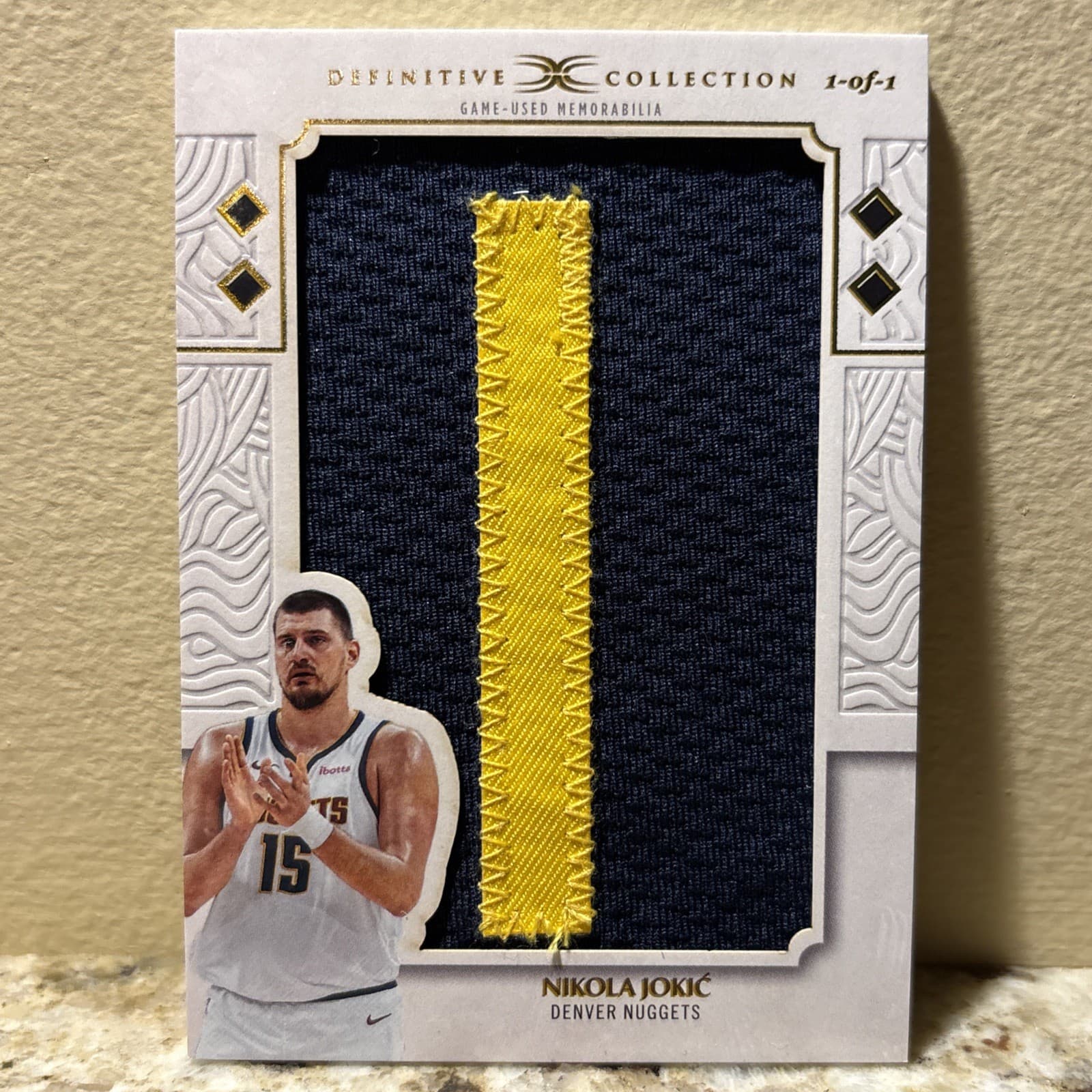 2025-26 Topps Definitive Nameplate Relic Nikola Jokic 1/1 Denver Nuggets DNP-NJI