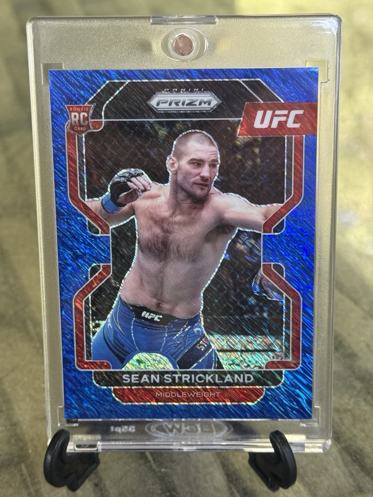 2022 Panini Prizm UFC Sean Strickland Rookie #172 Blue Shimmer Prizm /7 RC