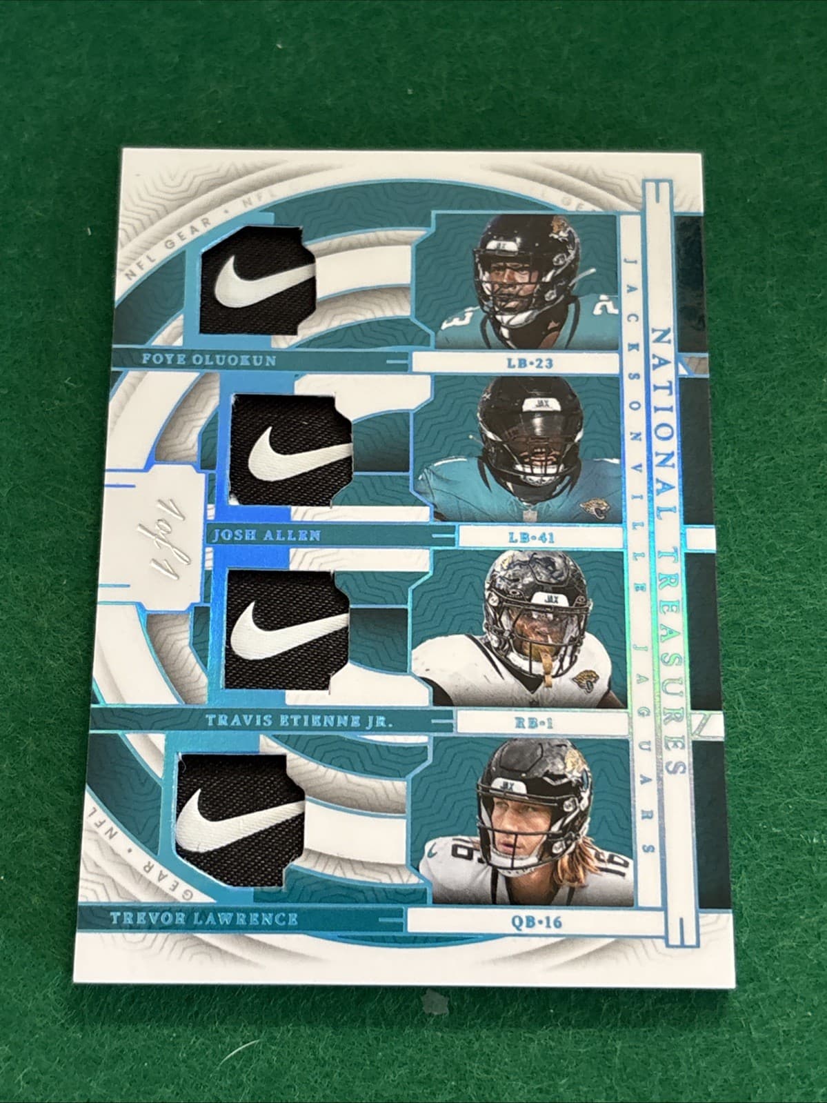 2023 National Treasures Quad NFL Gear Swoosh Lawrence/Etienne/Allen/Oluokun 1/1