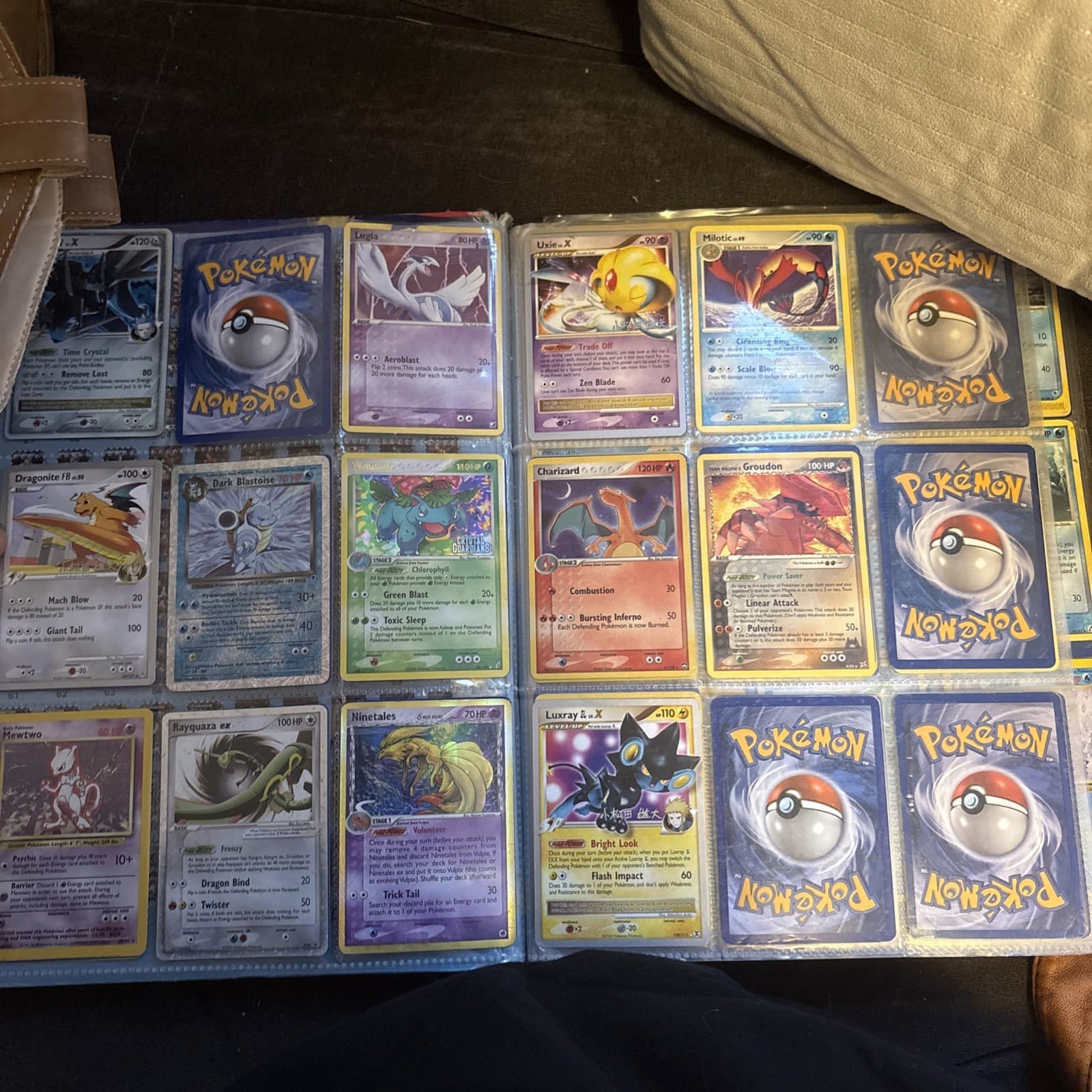 pokemon cards bulk/In plastic sleeves untouched since 2015 some since early 2000