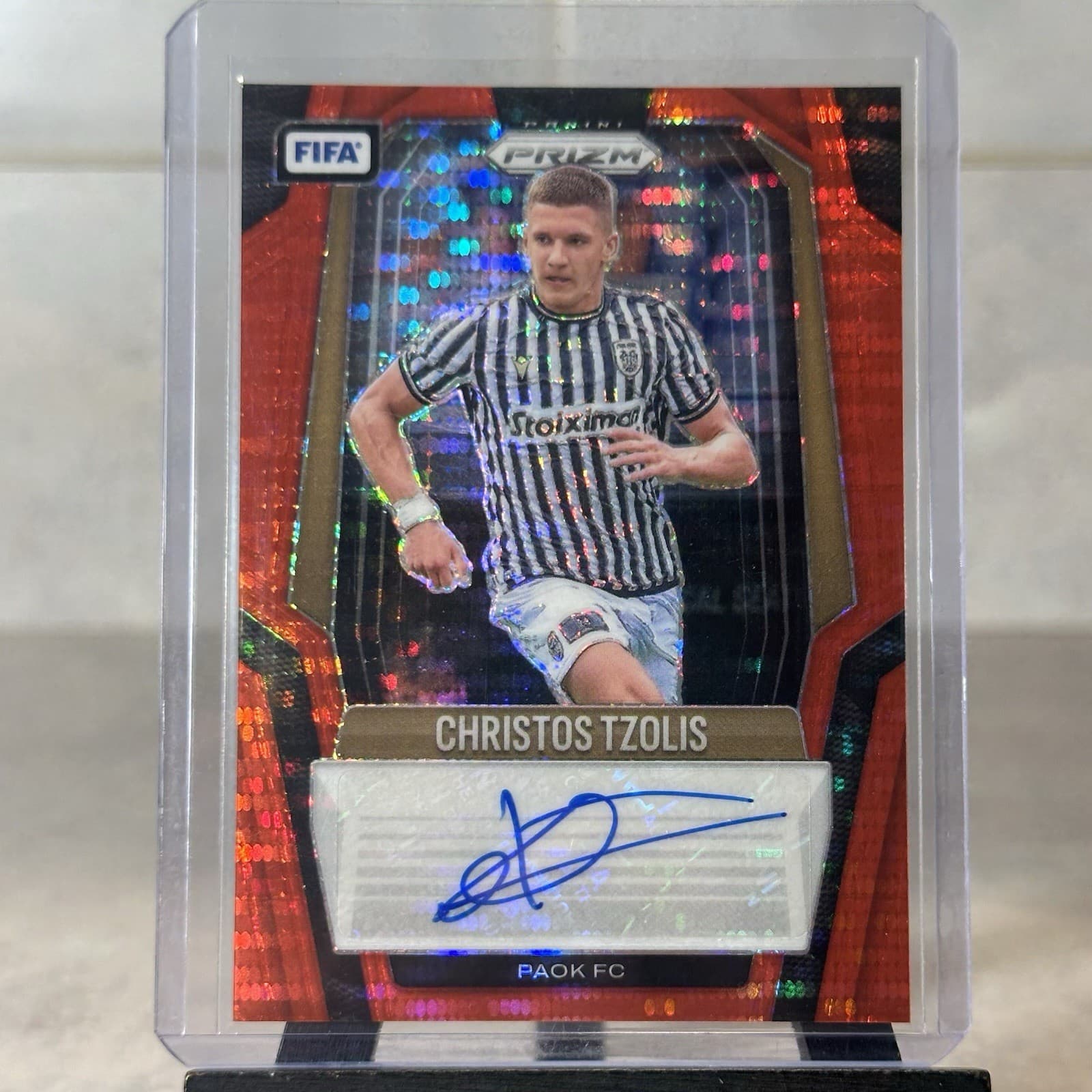 2025-26 Panini Prizm FIFA  Red Pulsar Christos Tzolis Auto S-CTZ PAOK