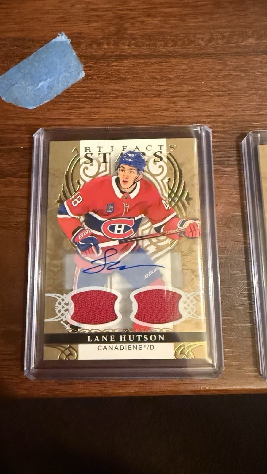 2026-27 Lane Hutson Upper Deck Artifacts Dual game Used Jeresy Auto Gold /45
