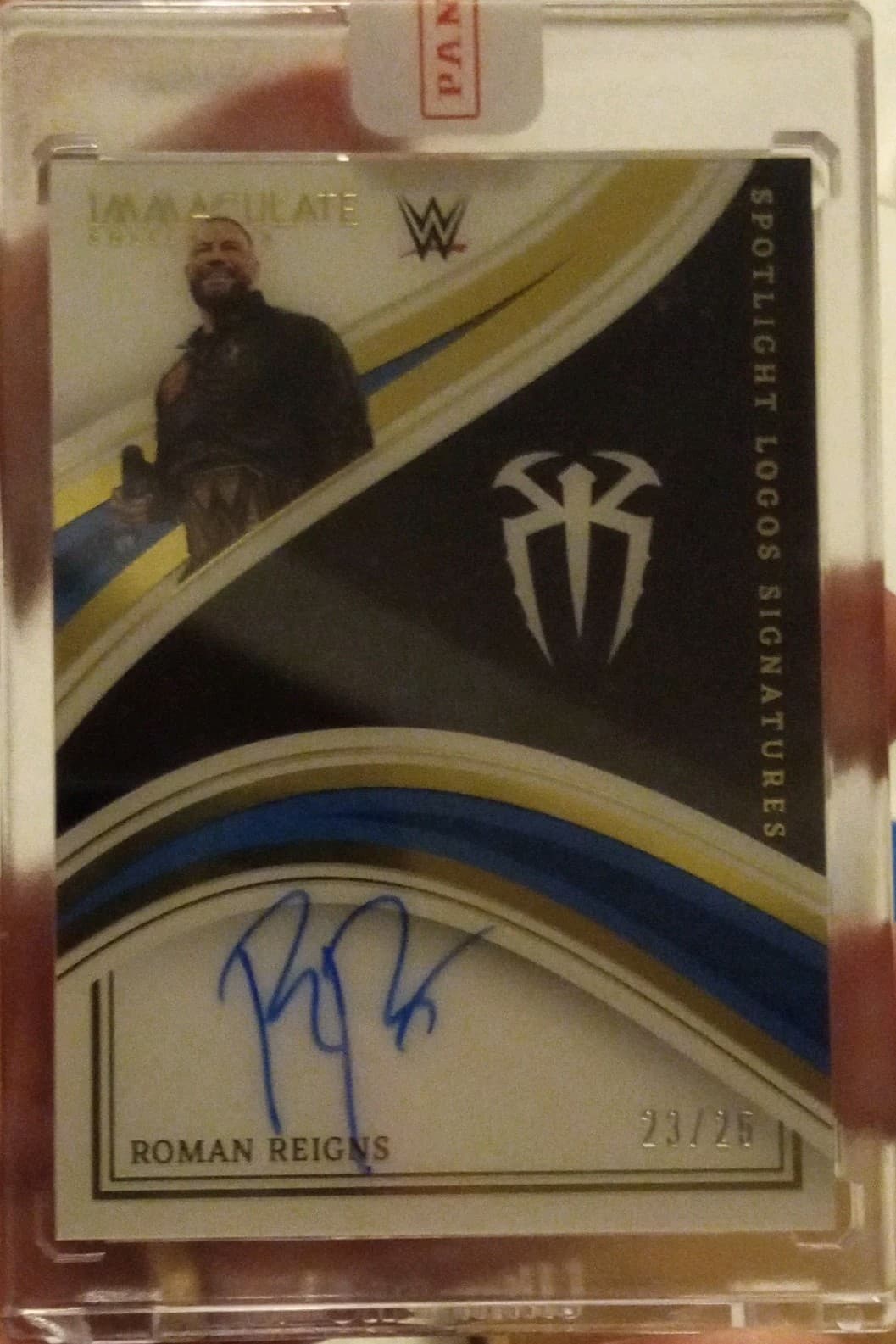 Panini 2022 Immaculate WWE Roman Reigns Premium Mem Auto #PM-RRN /49