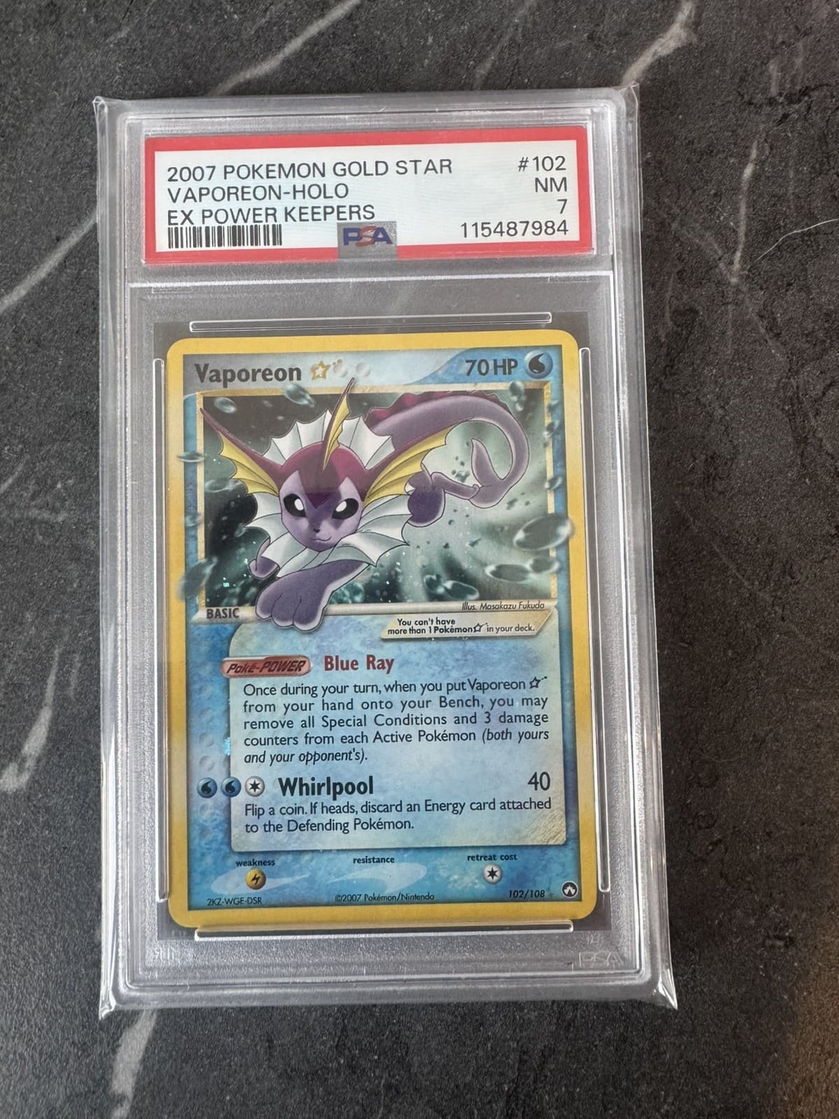 Pokemon PSA 7 Vaporeon Gold Star #102 Holo Ex Power Keepers 2007 English