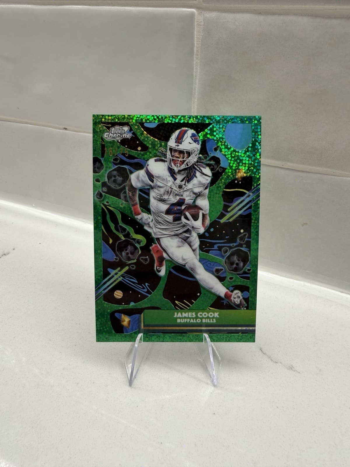 2025 Topps Cosmic Chrome Football James Cook #11 Refractor Bills /75