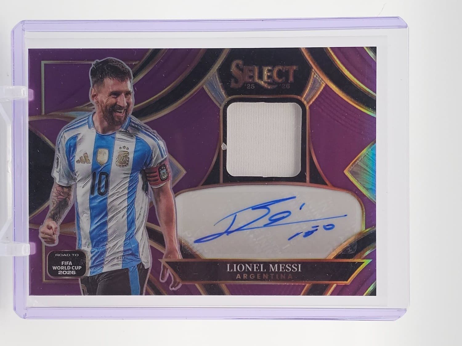 Lionel Messi 2026-27 Select Road to Fifa Patch Auto Purple Prizm /99 Q3562