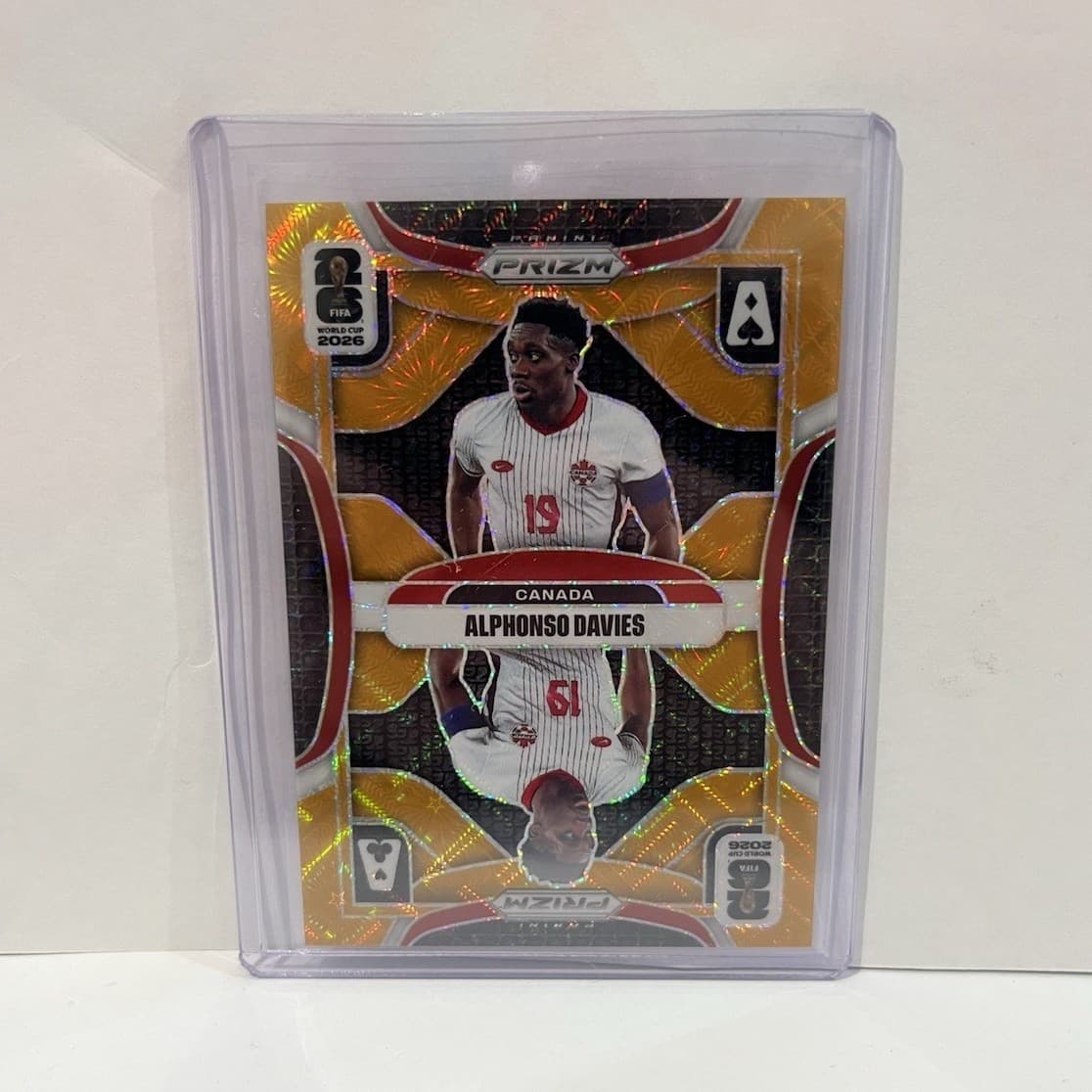 Panini Prizm FIFA World Cup 2026 Alphonso Davies Canada Gold No.14 /10