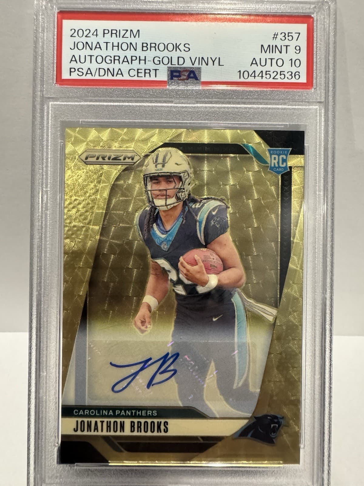2024 Panini Prizm Jonathon Brooks Auto Gold Vinyl PSA 9 Auto 10