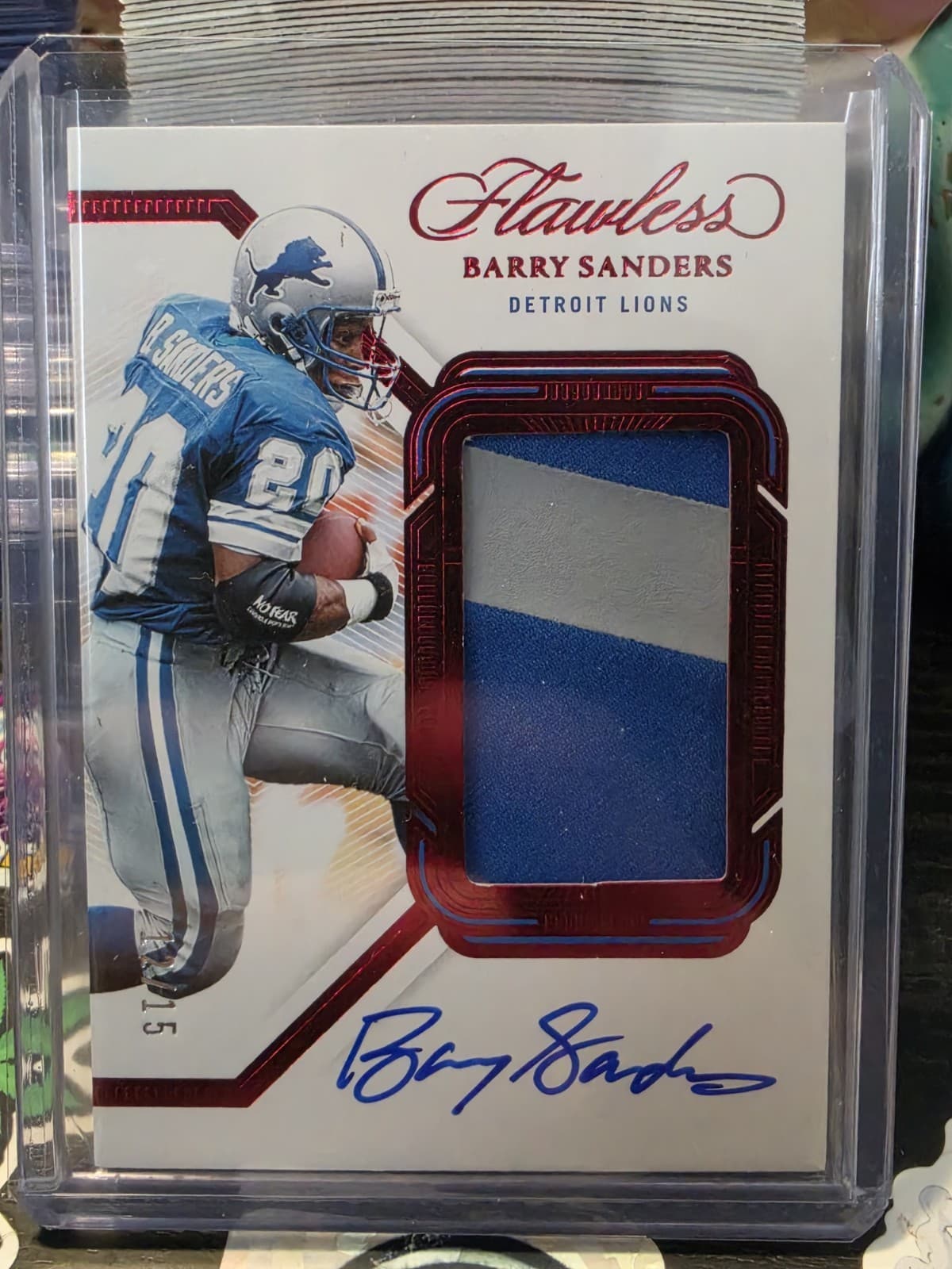2023 Panini Flawless - Patch Autographs Barry Sanders #PA-SSA Ruby /15 (AU, MEM)